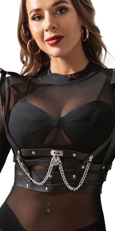 ARNÉS FORMA CORSET DETALLE CAD Imbracatura corsetto in pelle nera con catene.